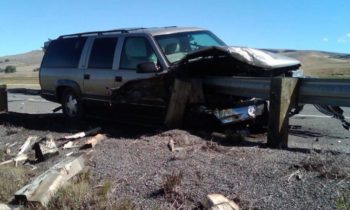 Distracted driving accident on I-90 ends with SUV impaled on guard rail