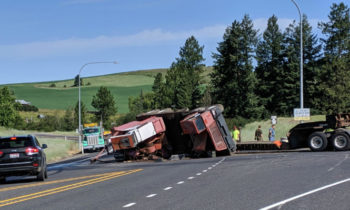 Crane leaking fuel after falling from semi-truck on SR-27 near Freeman