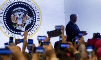 Eagle with golf clubs? Altered seal at Trump speech