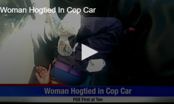 Woman Hogtied In Cop Car