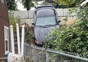 Car crashes into backyard of College Place resident