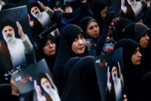 Big crowds in Iran capital for president’s funeral