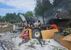 Benton County officials tackle a shed fire outside of Kennewick