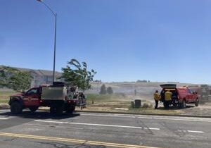 Fire on I-82 contained after threatening apartments