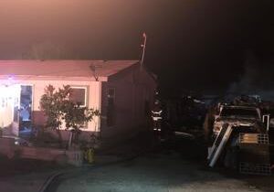 Gas leak in RV engine compartment causes fire in Kennewick, two homes damaged