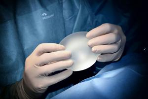 Woman who got rare cancer from her breast implants receives huge settlement