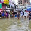 Floods swamp Bangladesh as nation finds its feet after protests