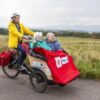 Town helps old and needy get out and about by cycling them around