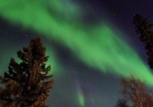 Solar flares may cause faint auroras across top of Northern Hemisphere