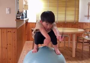 Boy trains to become jockey using a bouncing ball