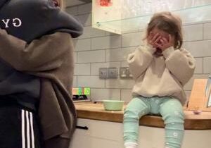 Funny moment daughter pretends to cry to steal dad’s hug from mom