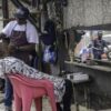 On Kinshasa’s streets hairdressers make a quick buck