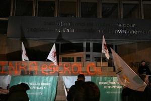 French farmers wall off public buildings in protest over regulations