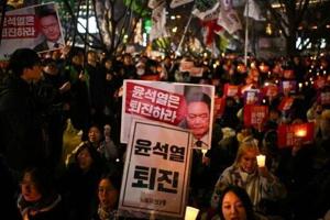 South Korean president clings to power after martial law U-turn