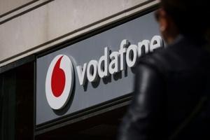 British regulator approves Vodafone UK, Three merger