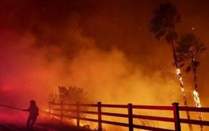 Wildfire in Malibu destroys homes, sends thousands fleeing