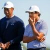 Tiger Woods and son Charlie share halfway lead in family event